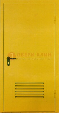 Желтая металлическая противопожарная дверь с вентиляционной решеткой ДТ-15 в Калуге
